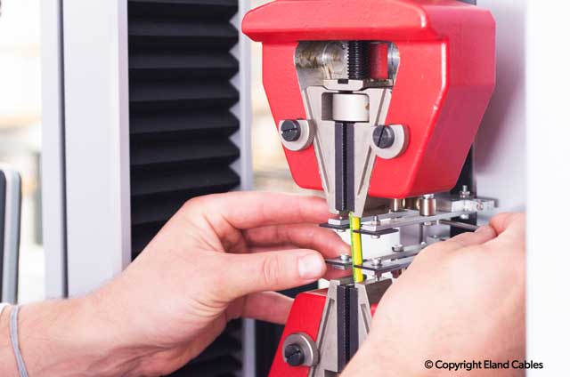 Cable insulation tensile and elongation measurement