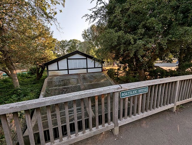An Archimedes screw site seen from a foot bridge in the UK