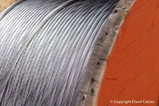 Using aluminium conductors instead of copper for overhead power distribution.