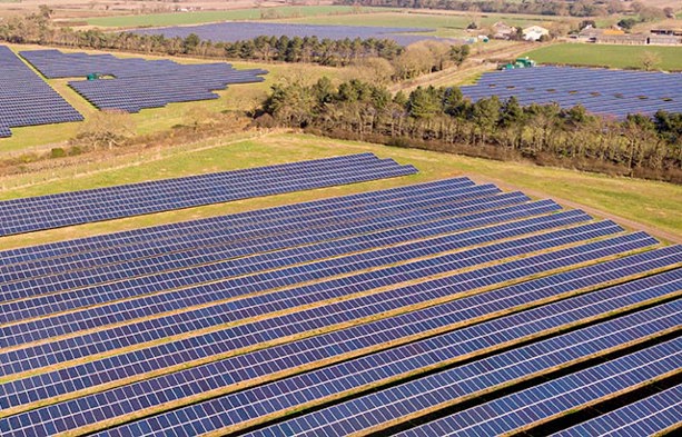 Solar panels in a field as example of agrivoltaics use
