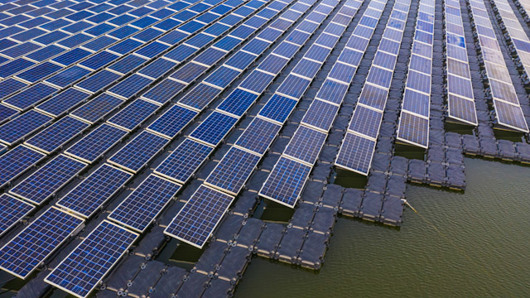 Innovative solar panels floating on water seen from above