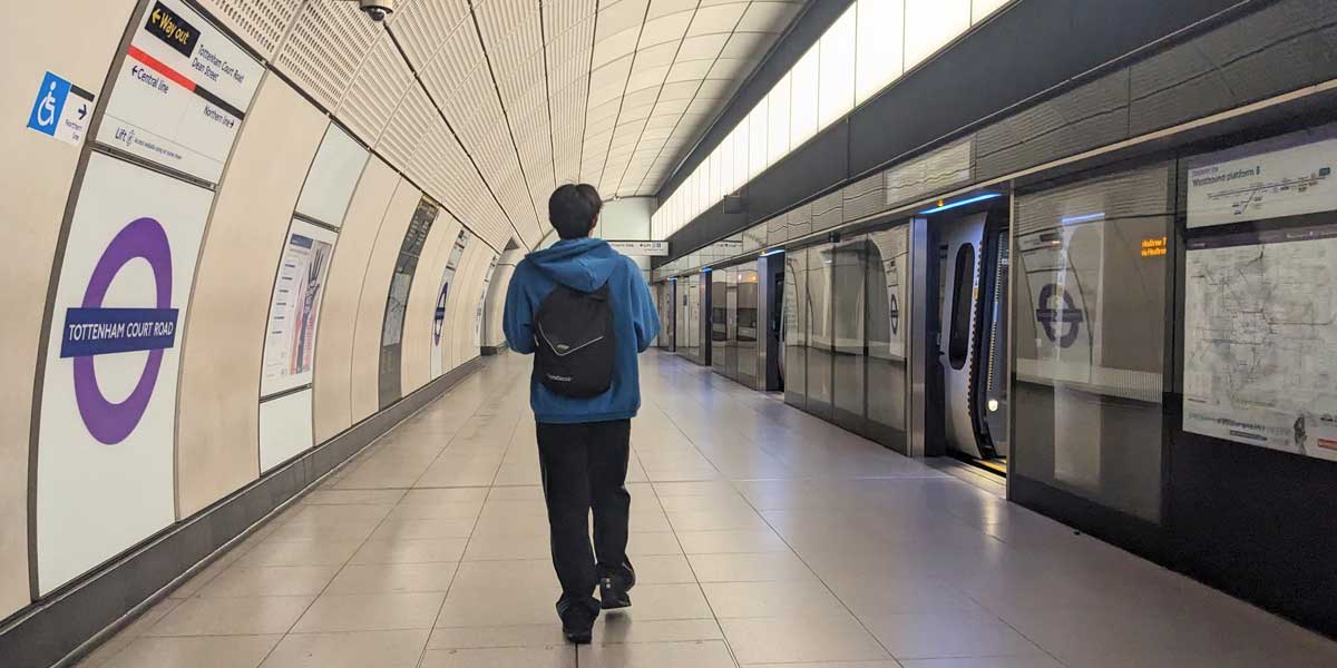A passenger on the platform of one of the new Elizabeth Line stations